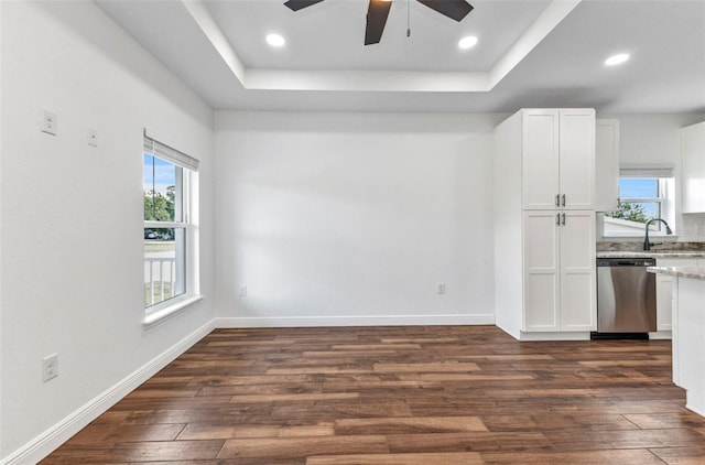 419 Carmalita St, Punta Gorda, FL 33950 - unfurnished room featuring a ceiling fan, dark wood-style floors, a tray ceiling, and recessed lighting