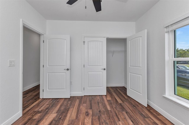 419 Carmalita St, Punta Gorda, FL 33950 - unfurnished bedroom with dark wood-style flooring, a closet, and ceiling fan