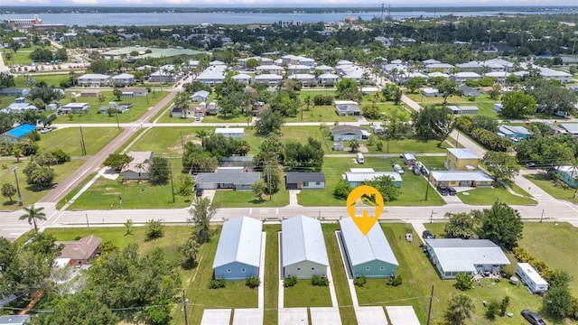 419 Carmalita St, Punta Gorda, FL 33950 - aerial view of property's location featuring nearby suburban area and a nearby body of water