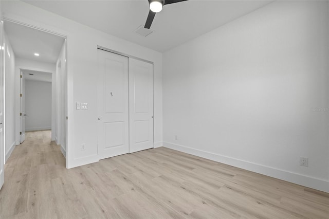 17156 Eugene Ave, Port Charlotte, FL 33954 - unfurnished bedroom with light wood finished floors, a closet, recessed lighting, and ceiling fan