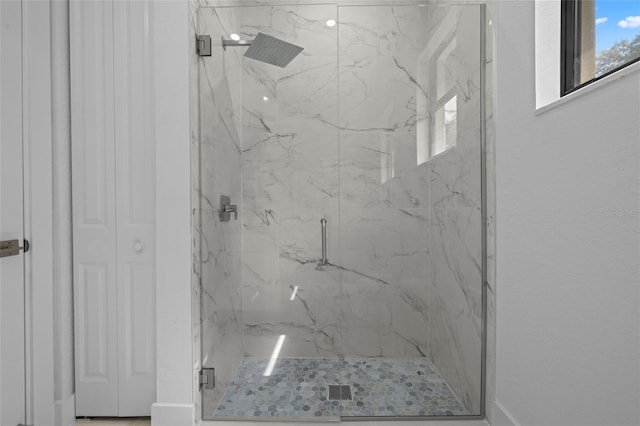 17156 Eugene Ave, Port Charlotte, FL 33954 - full bathroom with a marble finish shower and baseboards