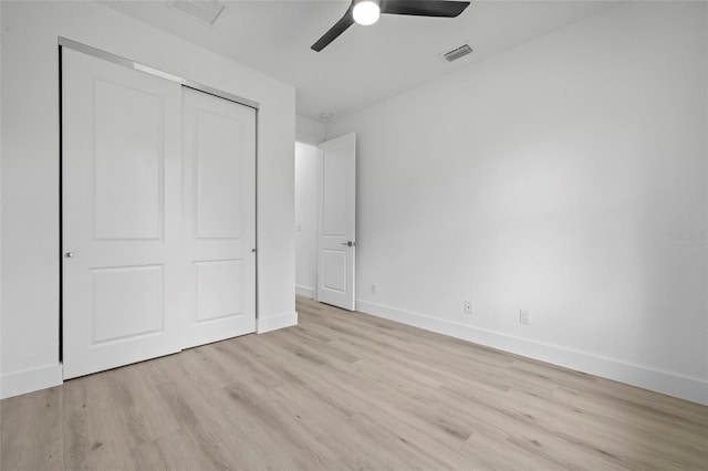 17156 Eugene Ave, Port Charlotte, FL 33954 - unfurnished bedroom with wood finished floors, a closet, and ceiling fan