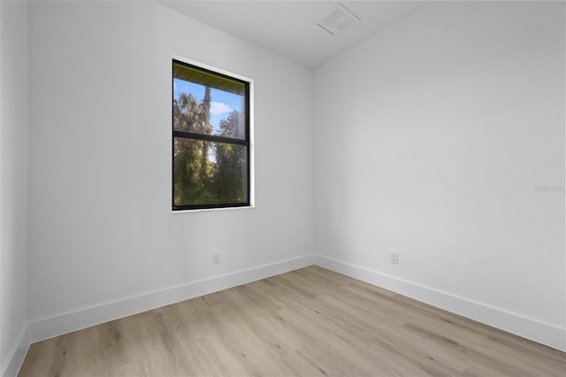 17156 Eugene Ave, Port Charlotte, FL 33954 - unfurnished room with light wood-style floors and baseboards