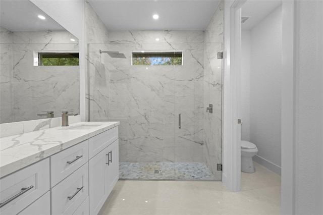 17156 Eugene Ave, Port Charlotte, FL 33954 - bathroom featuring a marble finish shower, plenty of natural light, and vanity