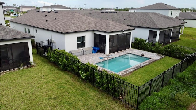 1992 Sunset Preserve Way, Port Charlotte, FL 33953 - rear view of house featuring a sunroom, a fenced backyard, roof with shingles, stucco siding, and a residential view