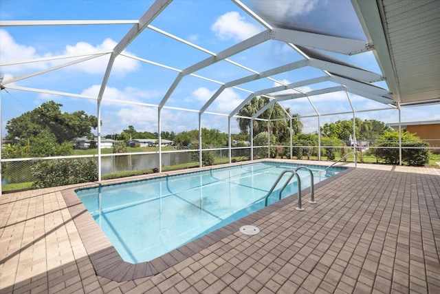 2309 Conway Blvd, Port Charlotte, FL 33952 - outdoor pool featuring a patio and glass enclosure