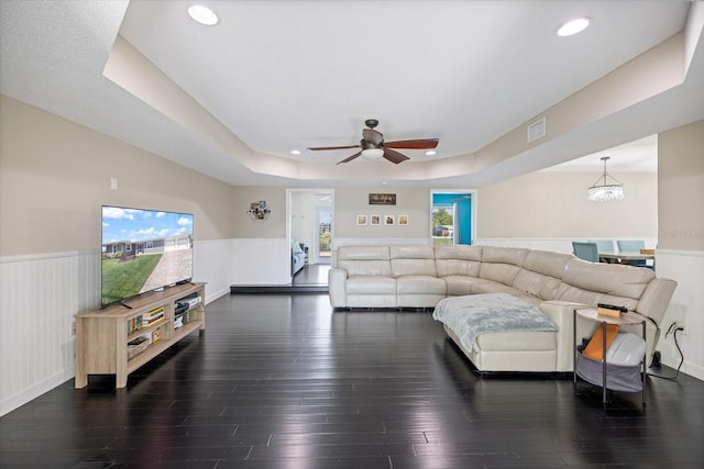 2309 Conway Blvd, Port Charlotte, FL 33952 - living area featuring a raised ceiling, a wainscoted wall, ceiling fan, wood finished floors, and recessed lighting