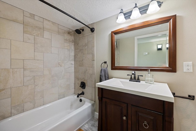 2309 Conway Blvd, Port Charlotte, FL 33952 - full bathroom featuring vanity, shower / tub combination, and a textured ceiling