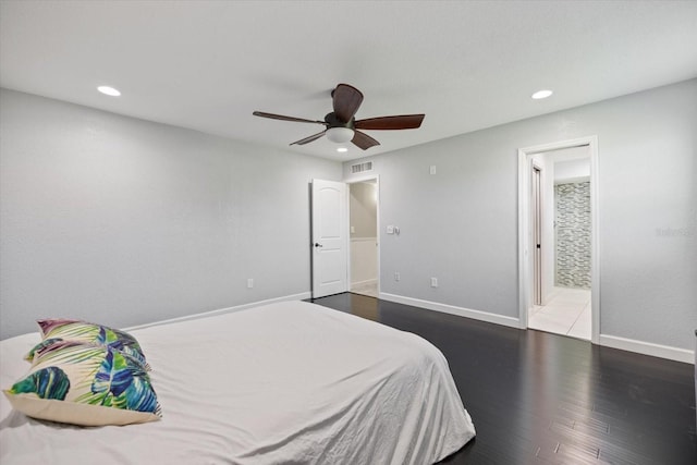 2309 Conway Blvd, Port Charlotte, FL 33952 - bedroom with recessed lighting, wood finished floors, ceiling fan, and ensuite bathroom