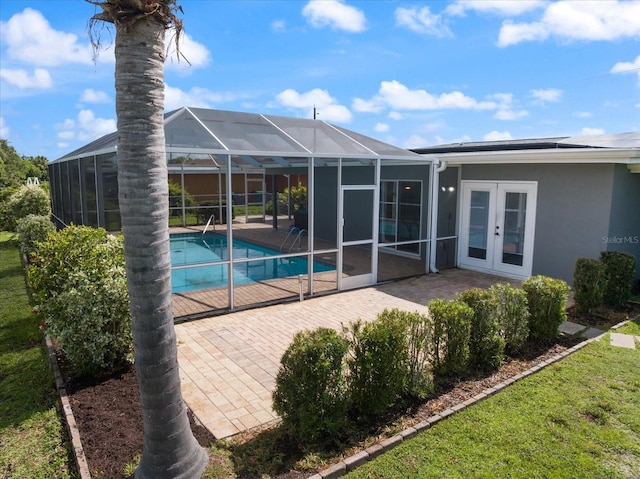 2309 Conway Blvd, Port Charlotte, FL 33952 - swimming pool featuring french doors, a patio, and a lanai
