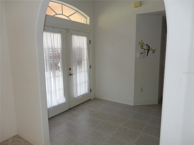 388 Orlando Blvd, Port Charlotte, FL 33954 - tiled entrance foyer with french doors and arched walkways