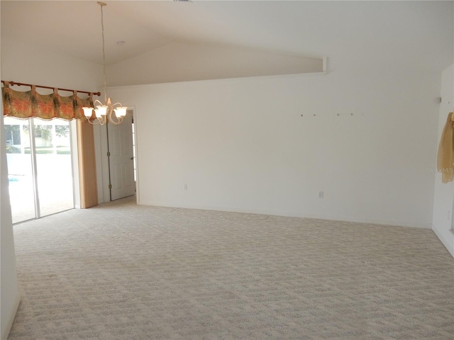 388 Orlando Blvd, Port Charlotte, FL 33954 - empty room with light carpet, a chandelier, and lofted ceiling