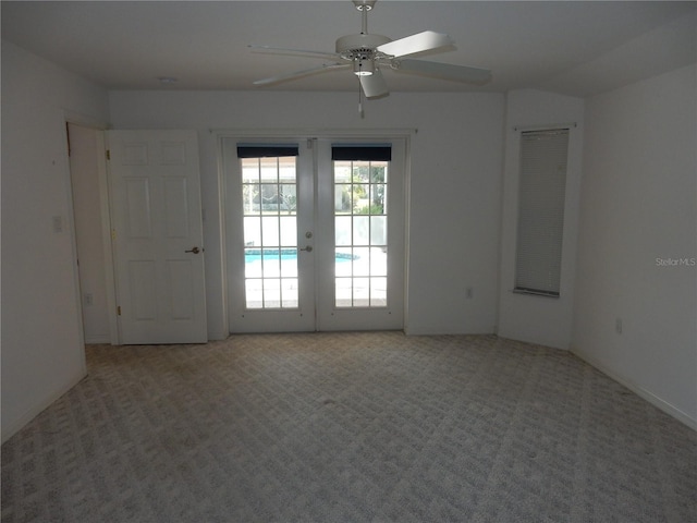 388 Orlando Blvd, Port Charlotte, FL 33954 - carpeted spare room featuring french doors and ceiling fan