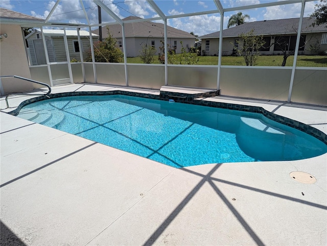 388 Orlando Blvd, Port Charlotte, FL 33954 - view of pool with a patio, glass enclosure, a residential view, and a pool with connected hot tub