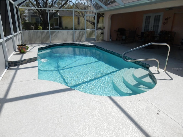 388 Orlando Blvd, Port Charlotte, FL 33954 - outdoor pool with french doors, a patio, and glass enclosure
