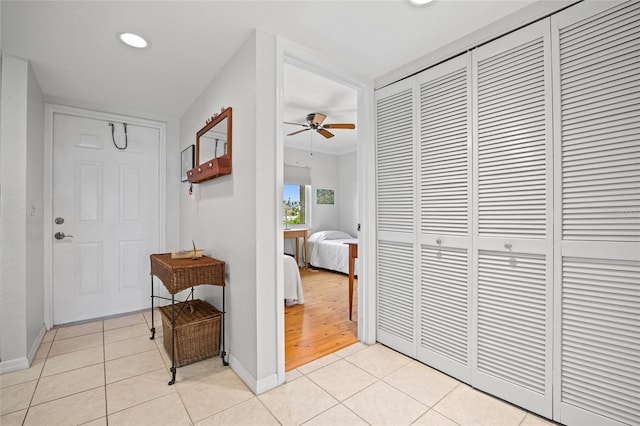 3221 White Ibis Ct Unit D1, Punta Gorda, FL 33950 - hallway featuring light tile patterned floors and recessed lighting