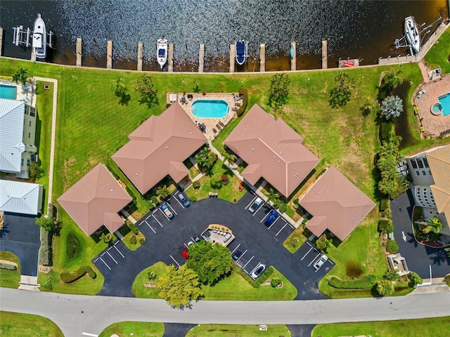 3221 White Ibis Ct Unit D1, Punta Gorda, FL 33950 - bird's eye view of a pool area and a large body of water