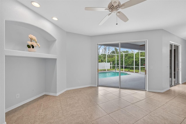 1762 Mincey Ter, North Port, FL 34286 - spare room featuring tile patterned flooring, a ceiling fan, and recessed lighting