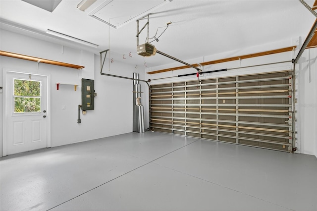 1762 Mincey Ter, North Port, FL 34286 - garage with electric panel and a garage door opener