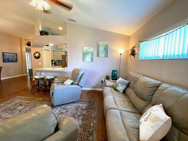 24132 Buckingham Way, Punta Gorda, FL 33980 - living room with lofted ceiling, dark wood-style floors, and ceiling fan