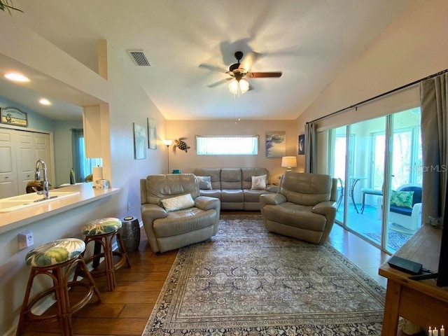 24132 Buckingham Way, Punta Gorda, FL 33980 - living room with lofted ceiling, wood-type flooring, and a ceiling fan