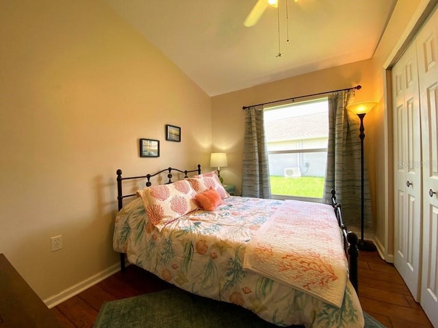 24132 Buckingham Way, Punta Gorda, FL 33980 - bedroom featuring wood finished floors, a closet, vaulted ceiling, and ceiling fan