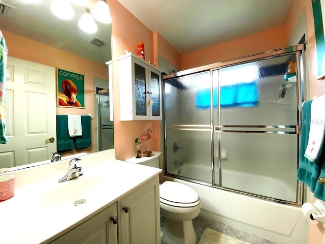 24132 Buckingham Way, Punta Gorda, FL 33980 - bathroom featuring vanity and shower / bath combination with glass door