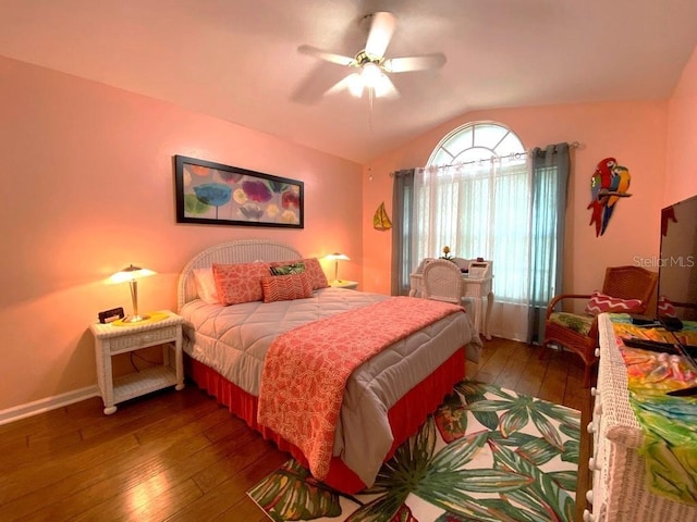 24132 Buckingham Way, Punta Gorda, FL 33980 - bedroom featuring vaulted ceiling, wood-type flooring, and ceiling fan