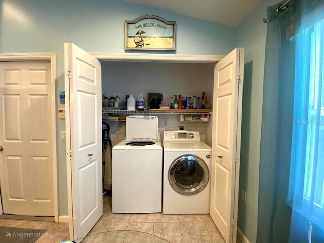 24132 Buckingham Way, Punta Gorda, FL 33980 - laundry room with washing machine and clothes dryer and light tile patterned floors