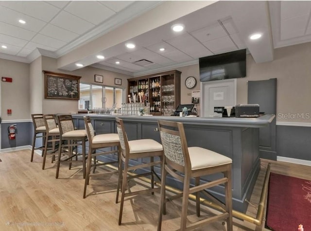 24132 Buckingham Way, Punta Gorda, FL 33980 - community bar area featuring light wood-style flooring, ornamental molding, and recessed lighting