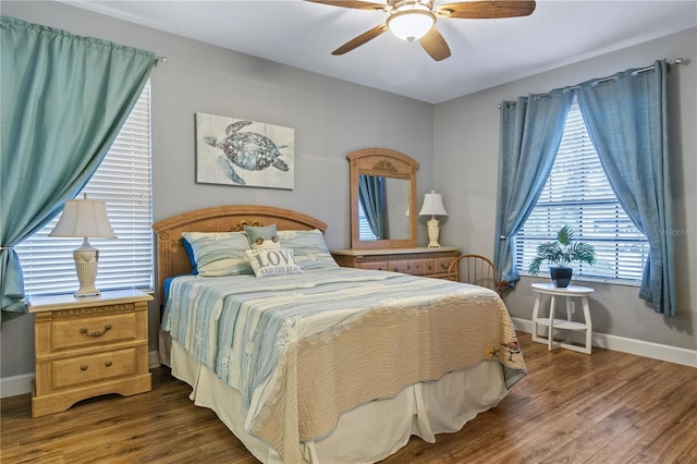 2712 Arugula Dr, North Port, FL 34289 - bedroom with wood finished floors and ceiling fan