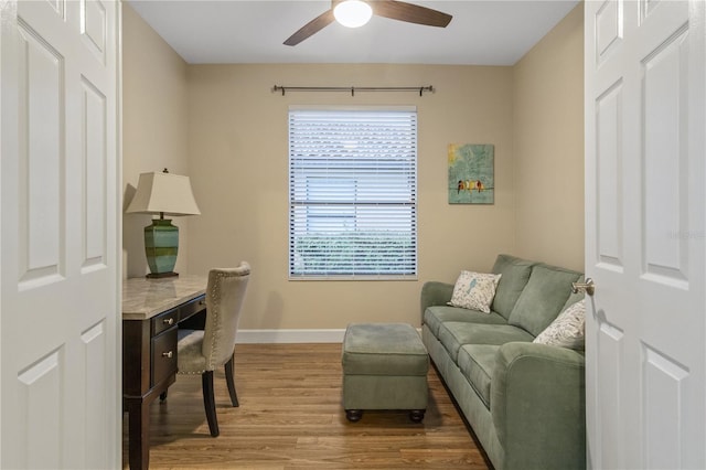 2712 Arugula Dr, North Port, FL 34289 - home office featuring light wood-type flooring, a ceiling fan, and built in desk