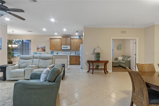 2712 Arugula Dr, North Port, FL 34289 - living area featuring a chandelier, ceiling fan, crown molding, recessed lighting, and light tile patterned floors