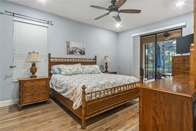 2712 Arugula Dr, North Port, FL 34289 - bedroom featuring access to exterior, wood finished floors, ceiling fan, and recessed lighting