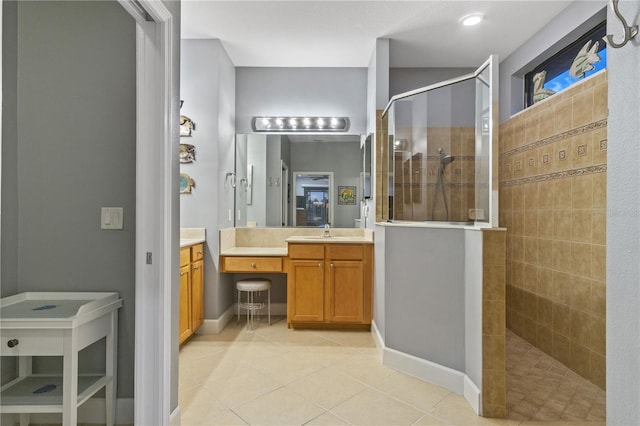 2712 Arugula Dr, North Port, FL 34289 - full bathroom featuring a walk in shower, vanity, and tile patterned flooring