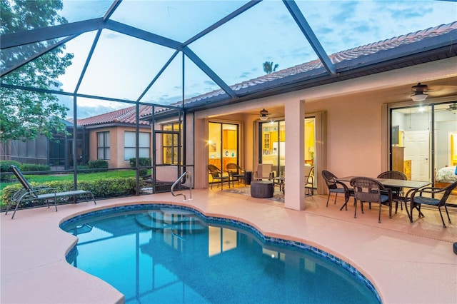 2712 Arugula Dr, North Port, FL 34289 - swimming pool with ceiling fan, a patio area, a lanai, and outdoor dining area