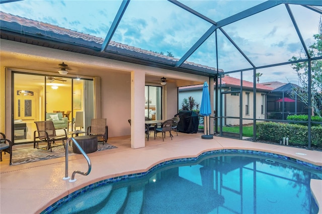 2712 Arugula Dr, North Port, FL 34289 - swimming pool featuring a ceiling fan, a patio, and glass enclosure