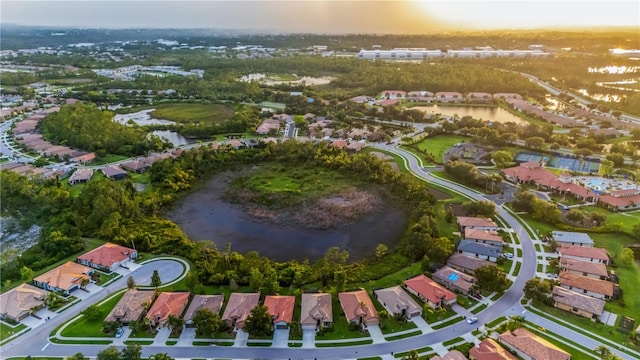 2712 Arugula Dr, North Port, FL 34289 - aerial view of property and surrounding area featuring nearby suburban area and a nearby body of water