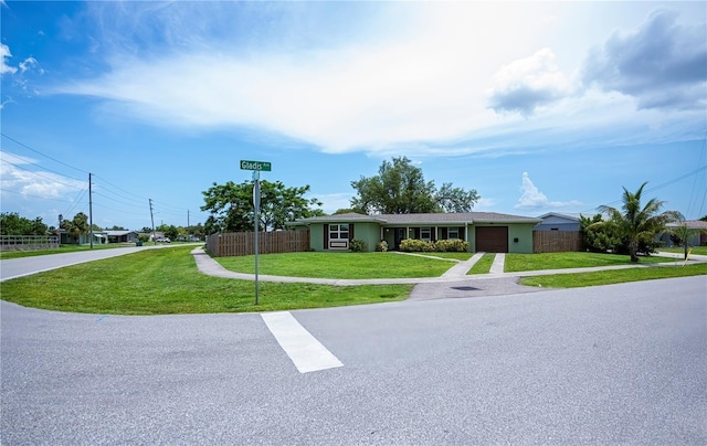 21539 Gladis Ave, Port Charlotte, FL 33952 - ranch-style house featuring driveway and an attached garage