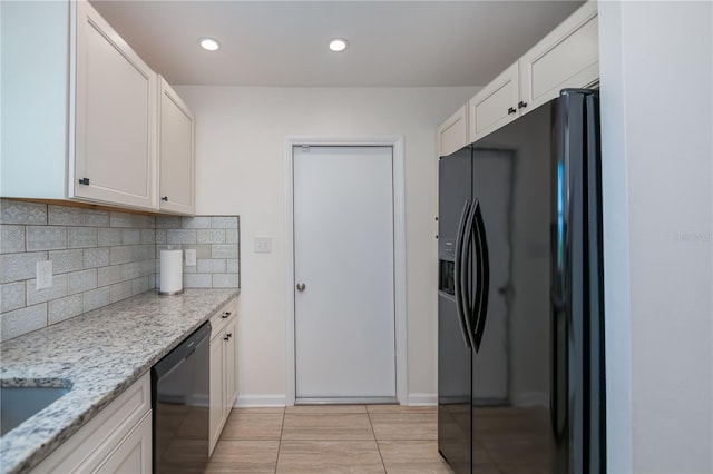 21539 Gladis Ave, Port Charlotte, FL 33952 - kitchen featuring black refrigerator with ice dispenser, dishwashing machine, white cabinets, tasteful backsplash, and recessed lighting