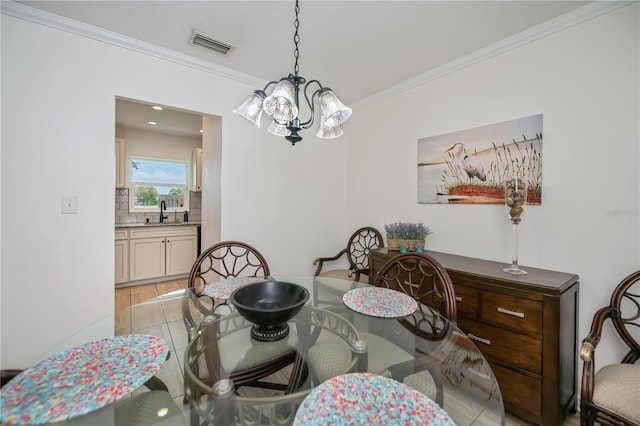 21539 Gladis Ave, Port Charlotte, FL 33952 - dining space with a chandelier and ornamental molding