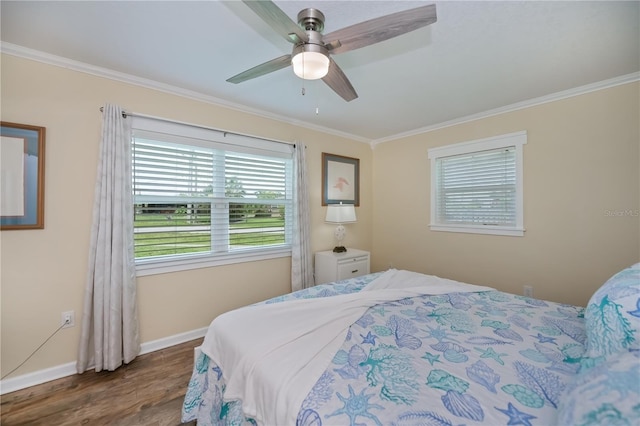 21539 Gladis Ave, Port Charlotte, FL 33952 - bedroom with crown molding, dark wood-type flooring, and ceiling fan