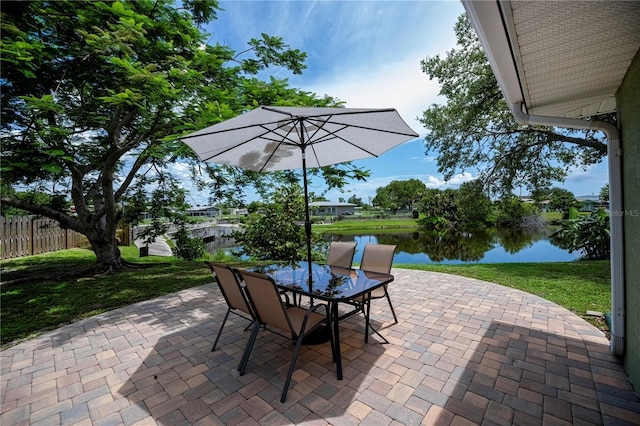 21539 Gladis Ave, Port Charlotte, FL 33952 - view of patio / terrace featuring a water view and outdoor dining area