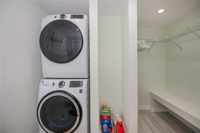 21539 Gladis Ave, Port Charlotte, FL 33952 - laundry area featuring stacked washer and clothes dryer and recessed lighting
