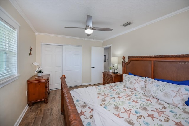 21539 Gladis Ave, Port Charlotte, FL 33952 - bedroom with wood finished floors, a closet, ornamental molding, and ceiling fan