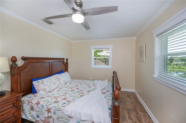 21539 Gladis Ave, Port Charlotte, FL 33952 - bedroom with wood finished floors, crown molding, and ceiling fan