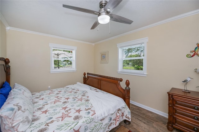 21539 Gladis Ave, Port Charlotte, FL 33952 - bedroom with wood finished floors, crown molding, multiple windows, and a ceiling fan
