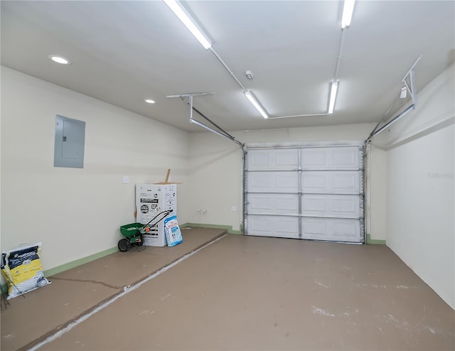 21539 Gladis Ave, Port Charlotte, FL 33952 - garage featuring electric panel and recessed lighting