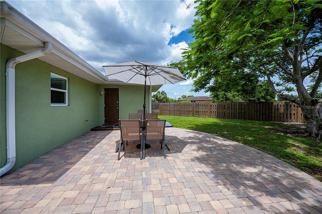 21539 Gladis Ave, Port Charlotte, FL 33952 - view of patio / terrace featuring outdoor dining space
