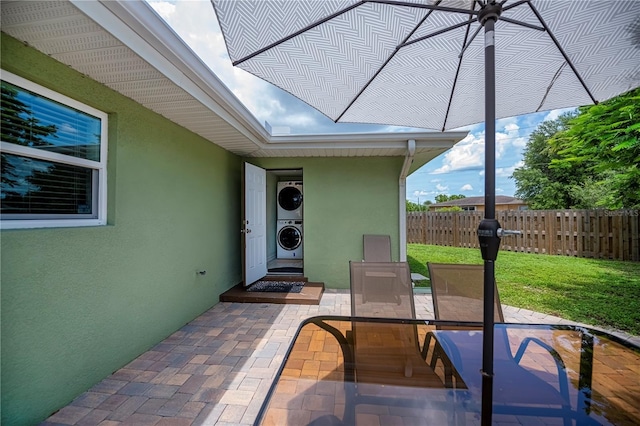 21539 Gladis Ave, Port Charlotte, FL 33952 - view of patio with stacked washer and clothes dryer